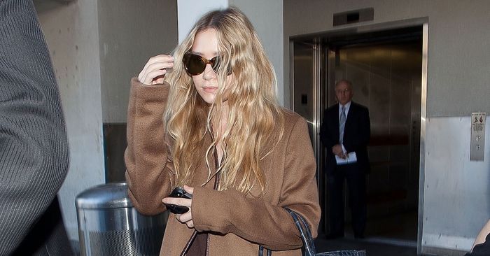 11 Celeb Airport Appears to be With Ballet Flats