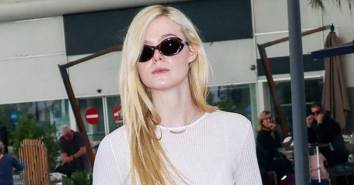 Elle Fanning Made a White Tee Look Elegant At the Airport